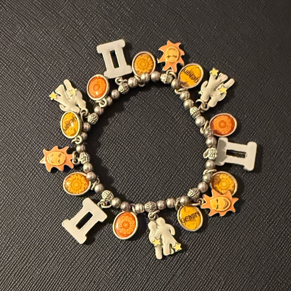 Stretchy Silver Gemini Zodiac Charm Bracelet with Orange/Yellow Accents